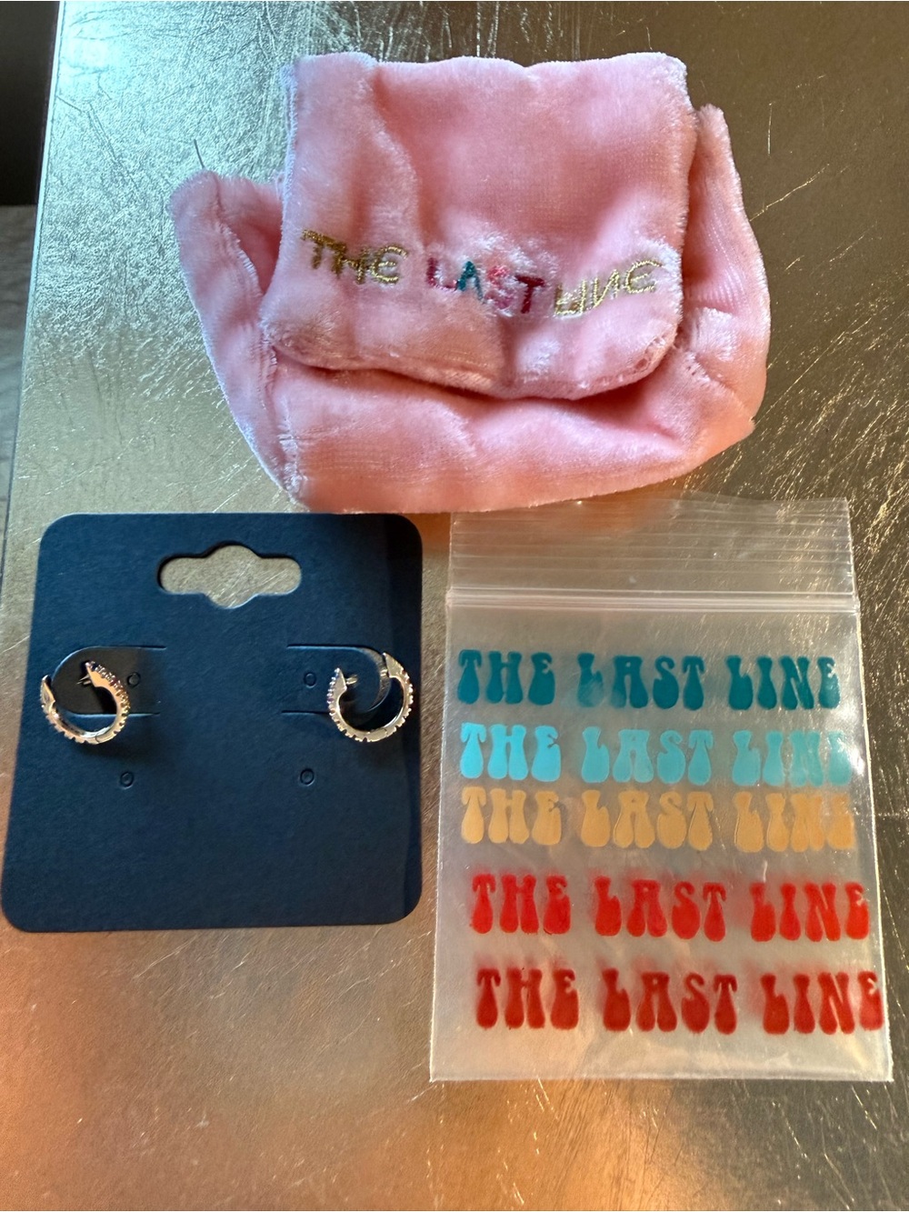 The Last Line rainbow huggie earrings - medium 14 k gold